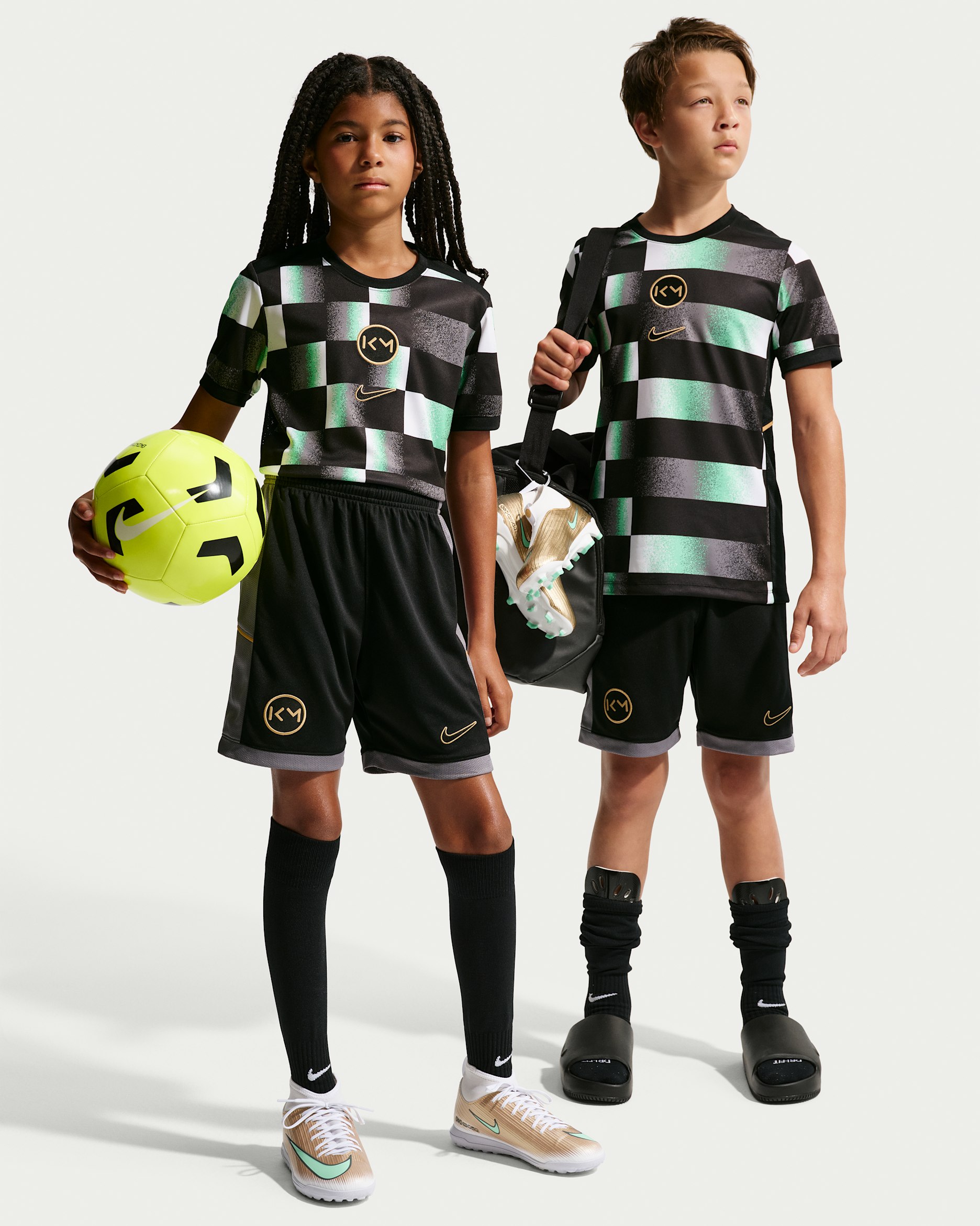 Kylian Mbappé Academy — Black/Smoke Grey/Metallic Gold