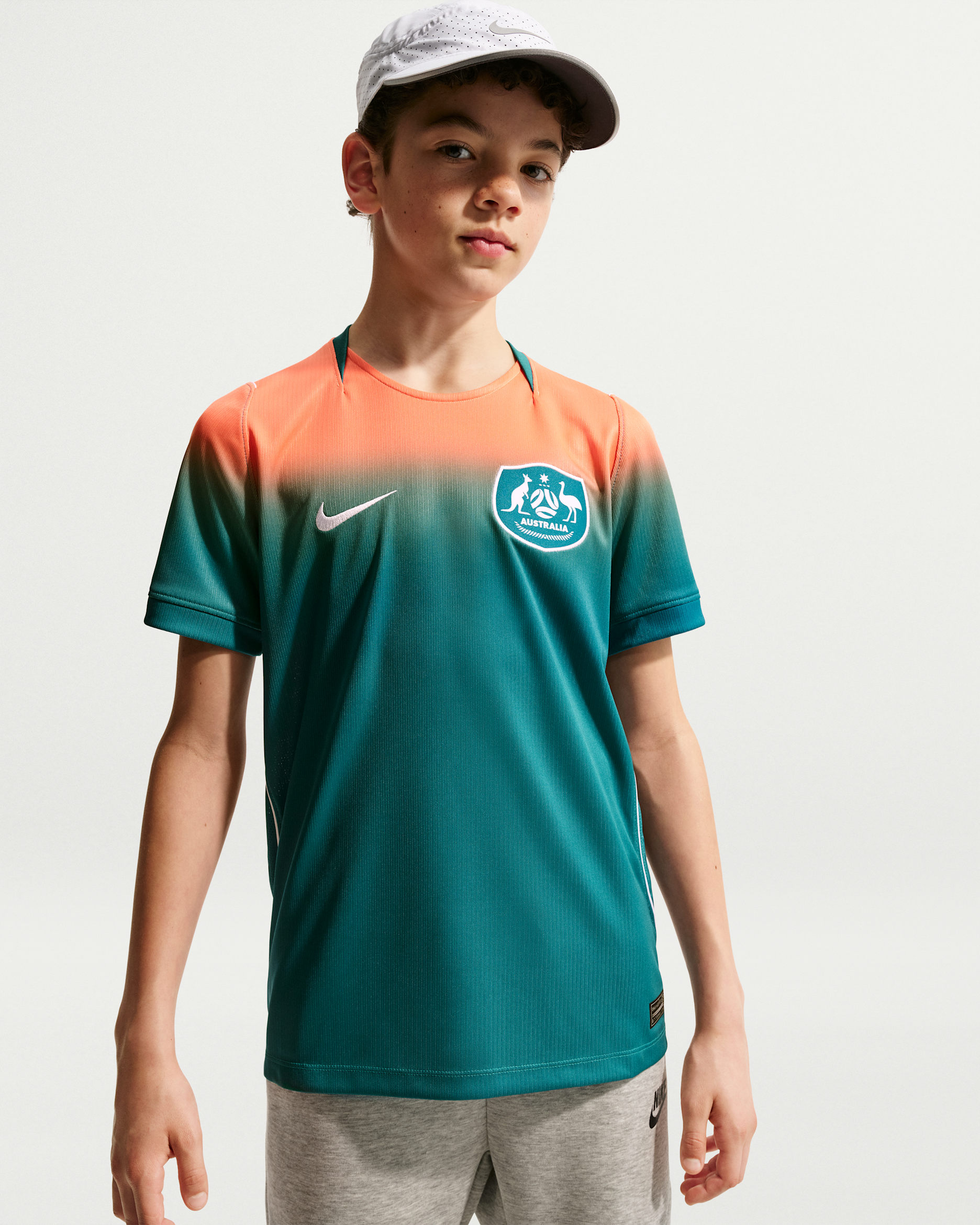 Australia 2026 Stadium Away — Bright Spruce/Orange Pulse/White/White