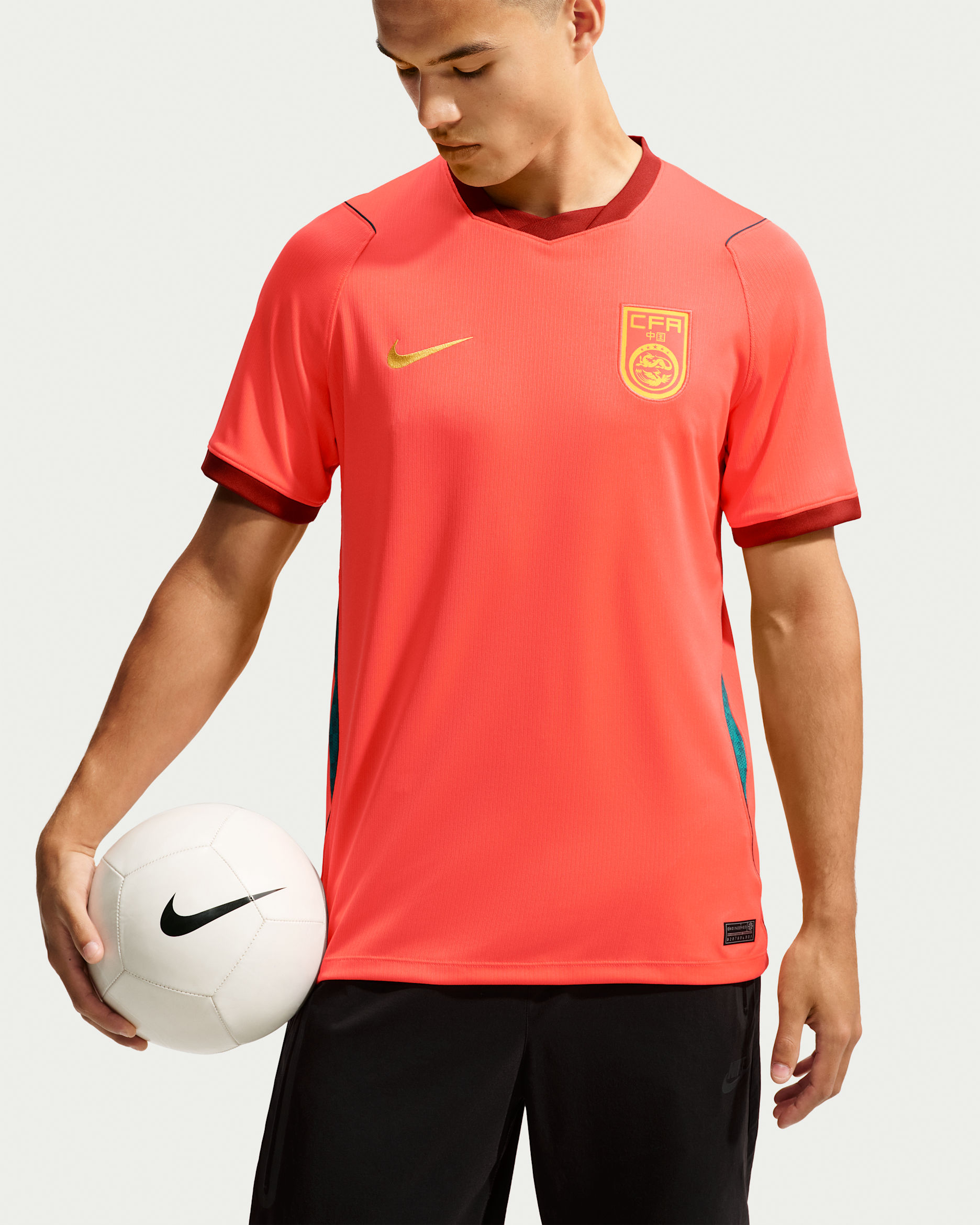 China 2026 Stadium Home — Bright Crimson/Team Red/Midnight Turquoise/Yellow Ochre