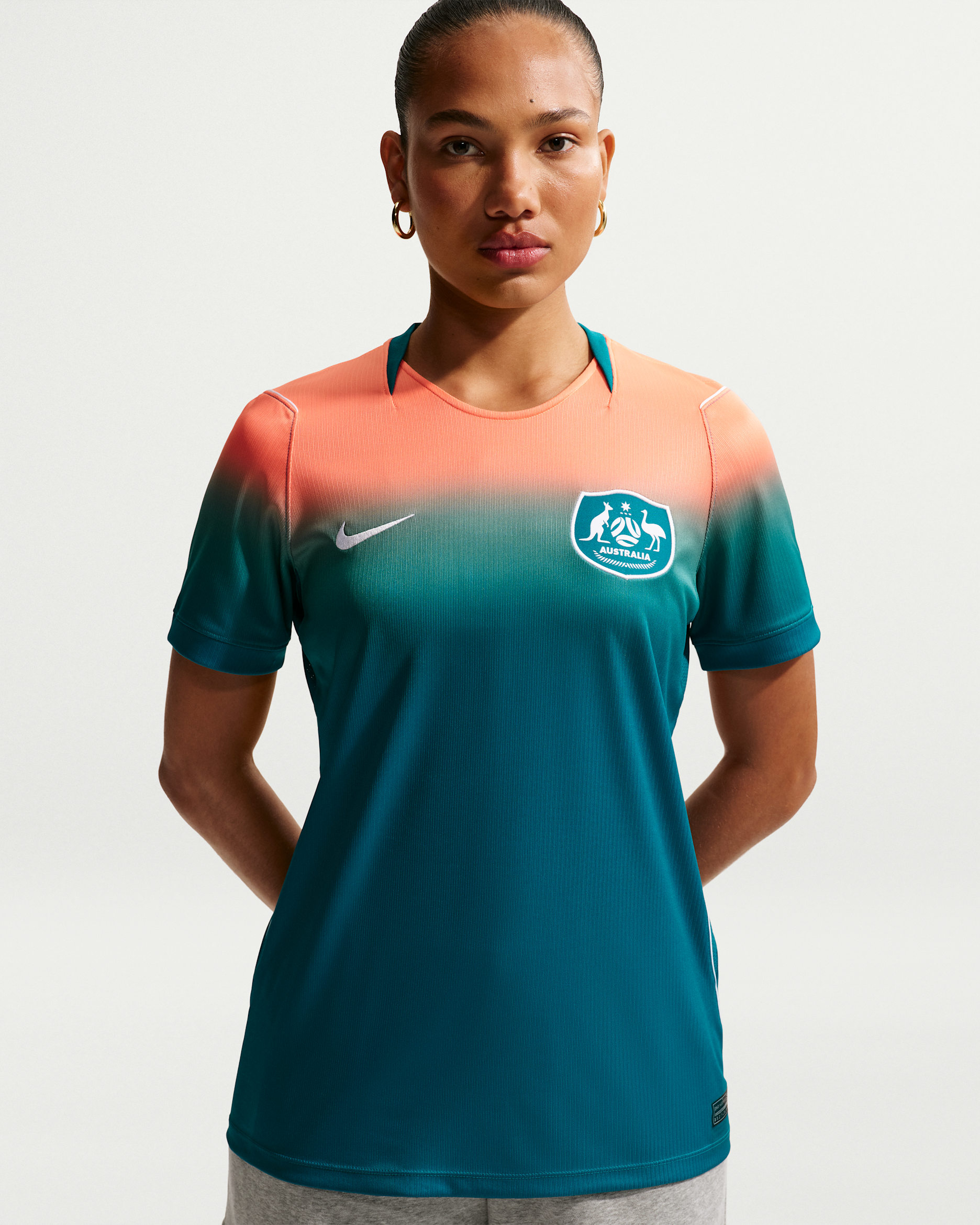 Australia 2026 Stadium Away — Bright Spruce/Orange Pulse/White/White